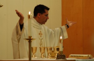 Father Mark Guzman at the Holy Thursday service.